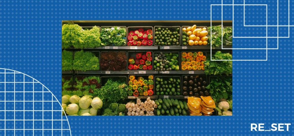 Supermarket shelves displaying fruit and veg