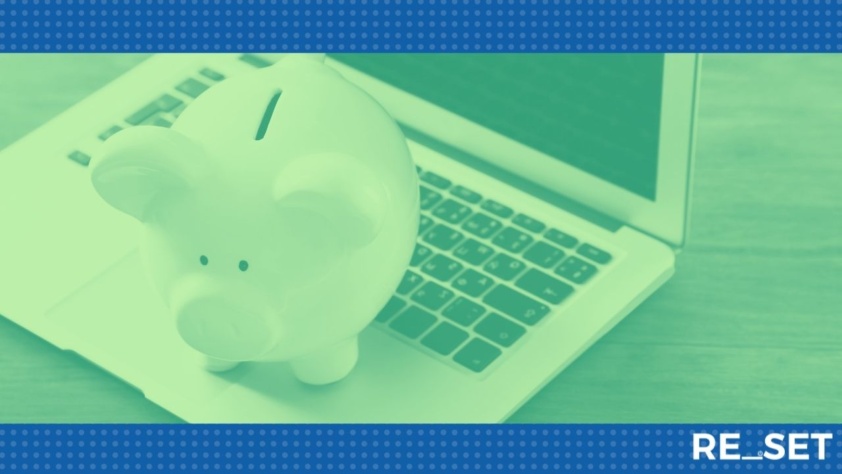 Piggy bank on a laptop